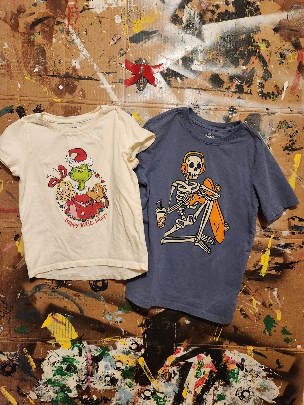 Kids Blue Skeleton Skateboard and A Grinish T‑Shirt. Bundle